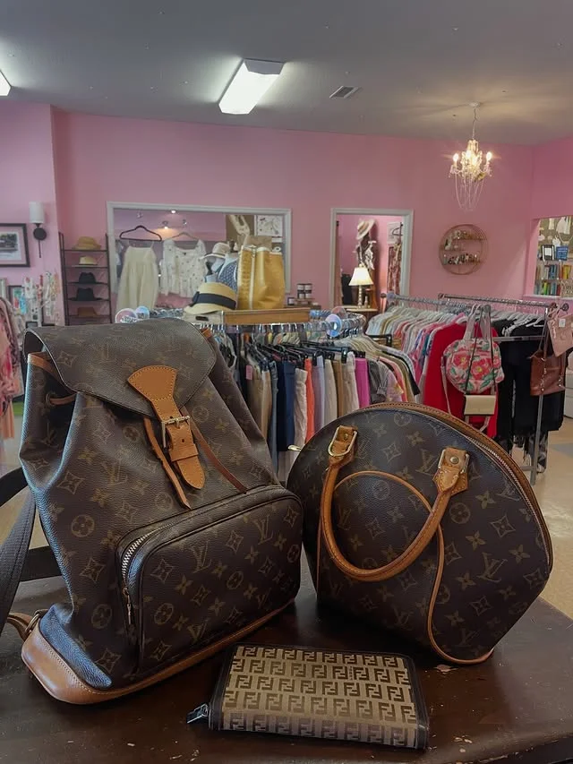 Handbags and clothing displays inside Pretty Clothes Shoppe